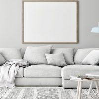 sofa-retratil-sala-moderna-branca-com-plantas